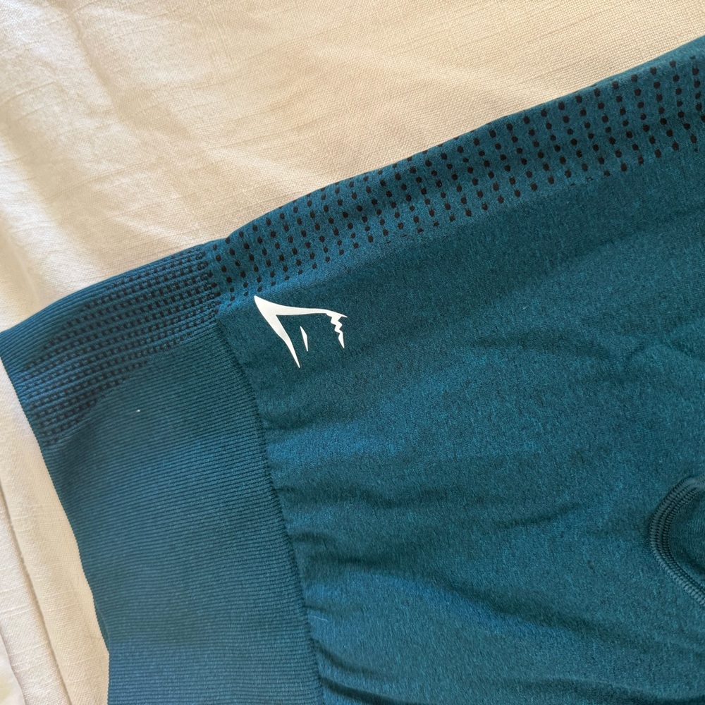 Two pairs of gym shark leggings